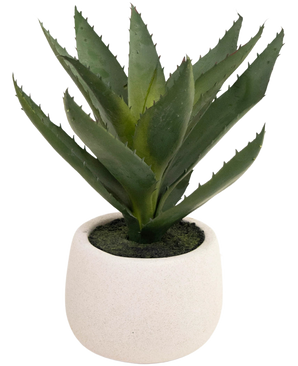 The Artificial Plant Aloe Vera 28 cm comes in a simple, round pot made of white ceramic, with lifelike green, spiky leaves against a plain white background.
