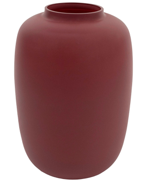 The Vase Artic Pink Ø21 x H29 cm is a simple vase made of maroon ceramic with a matte finish, a wide round shape and a narrow opening at the top.