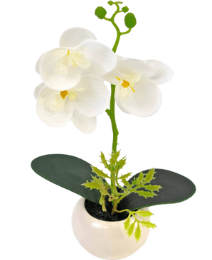 The Artificial Orchid 28 cm white in pot has three large white blossoms and two green leaves in a small white pot, against a plain background.