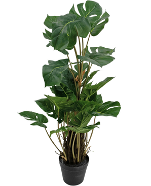 The Artificial Plant Monstera 90 cm is an artificial plant with large, glossy green leaves with natural splits, upright in a black pot against a plain white background.
