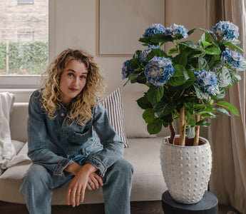 Create a warm atmosphere with artificial plants this winter