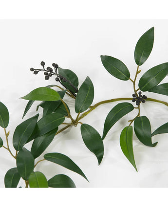 An Artificial Smilax Garland of 180 cm with long, narrow green leaves and small bunches of dark, round berries, depicted against a white background.