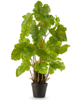 De Kunstplant Meloenblad 90 cm is een hoge kunstplant met brede, glanzend groene bladeren en meerdere rechtopstaande stengels, die staat in een eenvoudige zwarte pot tegen een effen witte achtergrond.