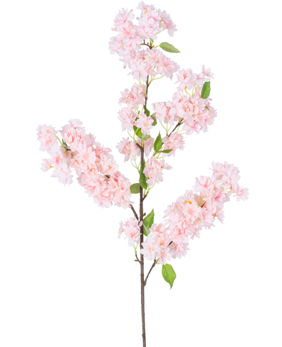 De Kunst Kersenbloesem 100 cm roze heeft een lange bruine steel, trossen lichtroze kersenbloesem bloemen en groene bladeren tegen een witte achtergrond.