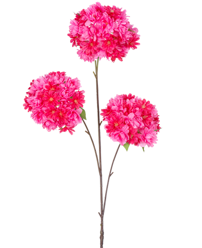 De Kunsttak Kersenbloesem 85 cm roze heeft een enkele steel met drie trossen felroze kunstmatige kersenbloesems en groene bladeren op slanke bruine takken, geïsoleerd op een witte achtergrond.