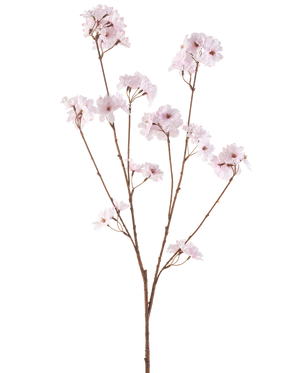 De Kunstbloem Kersenbloesem 114 cm lichtroze heeft een enkele bruine tak met meerdere dunne stengels, elk versierd met trosjes delicate, lichtroze kersenbloesems, tegen een effen witte achtergrond.