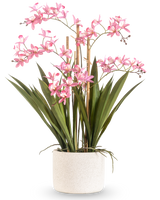 The Artificial Plant Mini Cymbidium Real Touch 58 cm pink has long green leaves and multiple pink flower stems, arranged in a structured white cylindrical pot, against a plain white background.