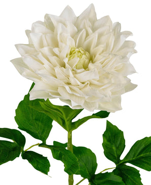 De Kunst Georgine Real Touch wit 70cm heeft een grote witte dahlia in volle bloei met gelaagde bloemblaadjes op een groene steel en bladeren, tegen een effen witte achtergrond.