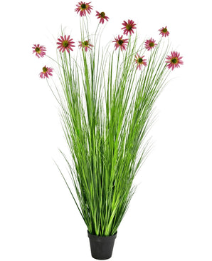 De Kunst Grasplant Chrysant 180 cm brandvertragend is een kunstplant in pot met hoge, dunne groene grasachtige bladeren en roze chrysantbloesems op lange stelen, afgebeeld tegen een witte achtergrond.