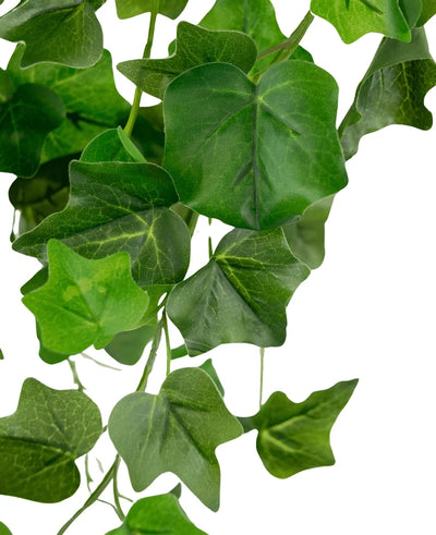 A close-up of Artificial Ivy 70 cm green, with several overlapping green ivy leaves with visible veins, hanging against a white background.