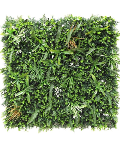 The Artificial Hedge Savanne fire retardant 100x100 cm is a square panel with dense, fire retardant artificial green foliage with mixed plant leaves such as ferns and grasses for a lush vertical garden effect.