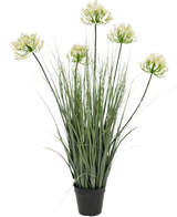 The Artificial grass white Agapanthus onion grass pot 90cm fire retardant is an artificial plant in a pot with high green leaves and six bunches of small, light yellow flowers on long stems, against a plain white background.