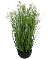 The Artificial Grass white Gesang Flower onion grass pot is a 90cm fire retardant artificial plant with long, thin green leaves and delicate white flowers in a round black pot, against a plain white background.