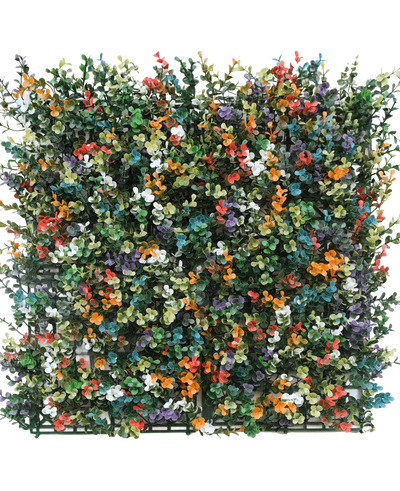 De Kunsthaag Buxus multi-color 50x50 cm UV is een vierkant paneel van dichte kunst buxus met kleine blaadjes en trosjes oranje, witte, rode, gele, paarse en blauwe bloemen op een groene kunststof rasterachtergrond.