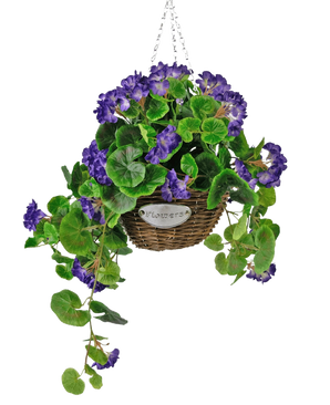 The Artificial Begonia purple in basket UV 70cm is a hanging wicker basket with green leaves and vibrant purple flowers, suspended from a silver chain and fitted with a small metal label with the text "Flowers.