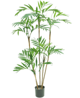 De Kunstplant Parlour Deluxe 120 cm is een hoge kamerpalm in pot met meerdere slanke bruine stengels en trossen lange, smalle groene bladeren, tegen een effen witte achtergrond.